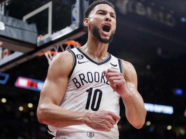 TORONTO, ON - NOVEMBER 23: Ben Simmons #10 of the Brooklyn Nets reacts after getting a block on Chris Boucher #25 of the Toronto Raptors during the second half of their NBA game at Scotiabank Arena on November 23, 2022 in Toronto, Canada. NOTE TO USER: User expressly acknowledges and agrees that, by downloading and or using this photograph, User is consenting to the terms and conditions of the Getty Images License Agreement. (Photo by Cole Burston/Getty Images)