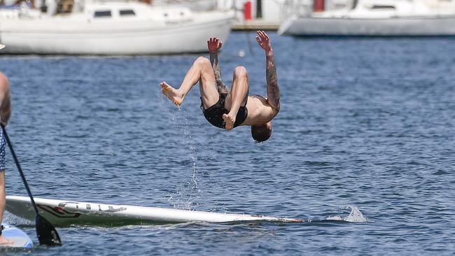 Tim Membrey takes a dive after pre-season training. Picture: Jason Edwards