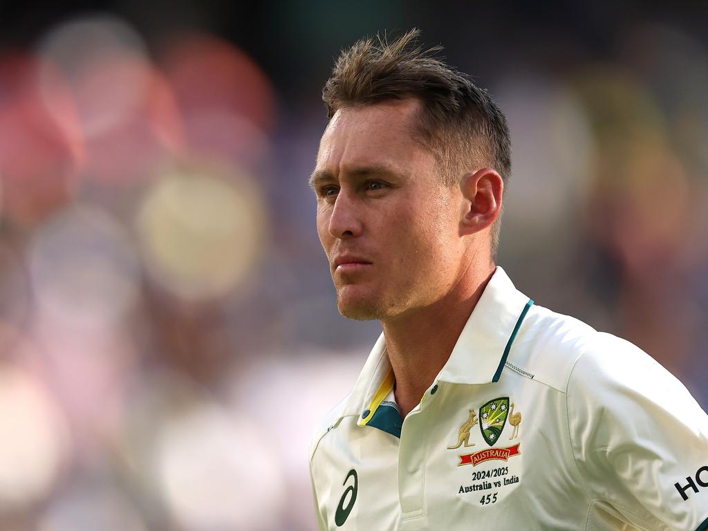 PERTH, AUSTRALIA - NOVEMBER 24: Marnus Labuschagne of Australia walks off the field after being dismissed by Jasprit Bumrah of India for 3 runs during day three of the First Test match in the series between Australia and India at Perth Stadium on November 24, 2024 in Perth, Australia. (Photo by Cameron Spencer/Getty Images)