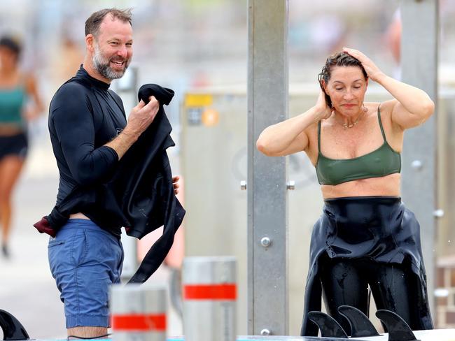 They both smiled and looked happy during the beach date. Picture: Backgrid