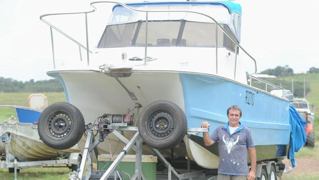 Vic Hislop and his boat that the swallows built their nest on.Photo: Alistair Brightman / Fraser Coast Chronicle