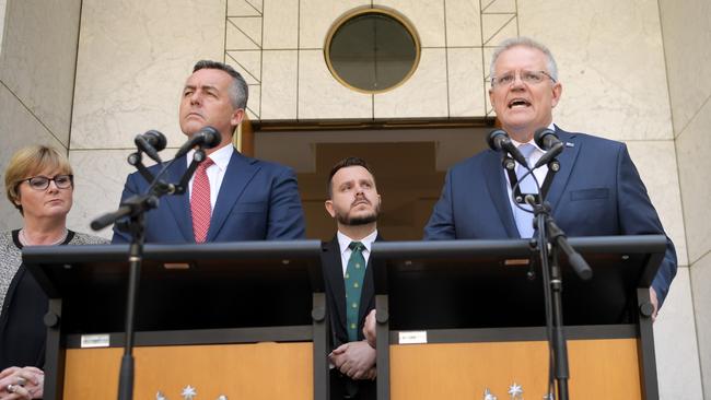 Prime Minister Scott Morrison announces the appointment of a permanent independent commissioner to investigate veteran suicide with (L-R) Australian Defence Minister Linda Reynolds, Australian Veterans' Affairs Minister Darren Chester and Liberal member Herbert Philip Thompson at Parliament House. (Photo by Tracey Nearmy/Getty Images)