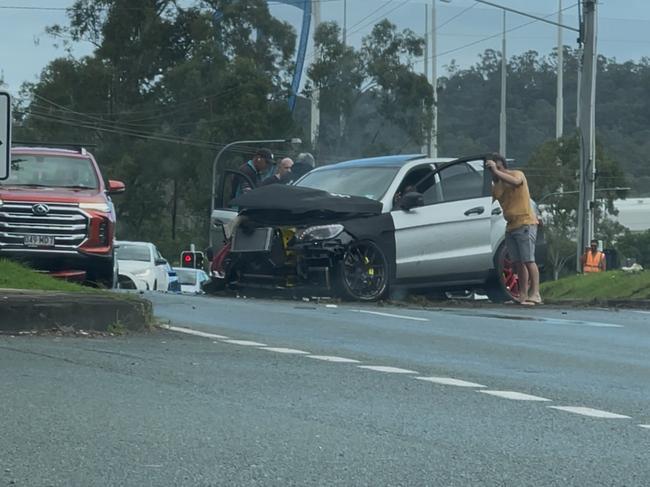 A Mercedes has crashed into a power pole on the Gold Coast. Picture: Charlton Hart