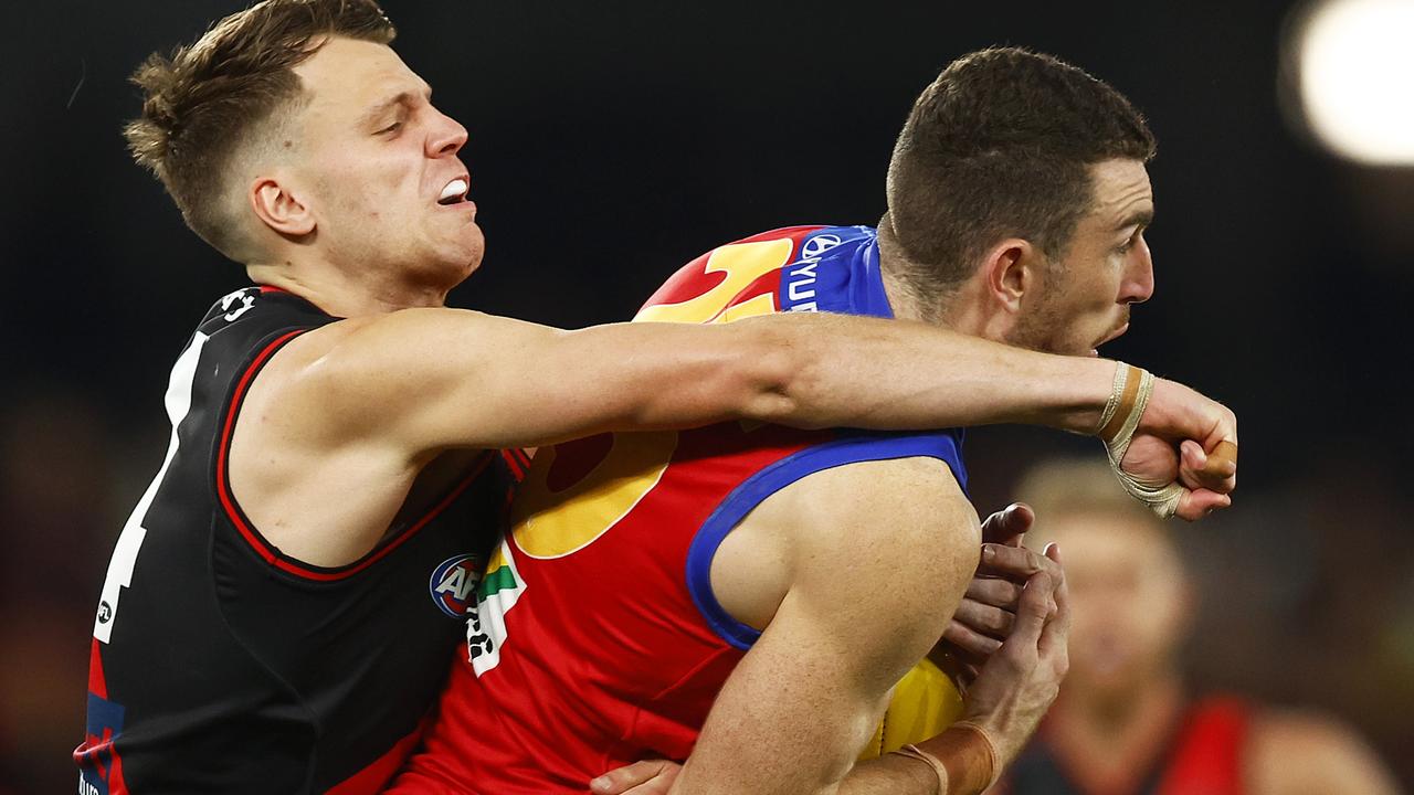 Daniel McStay attempts to mark the ball against Jordan Ridley in round 2.