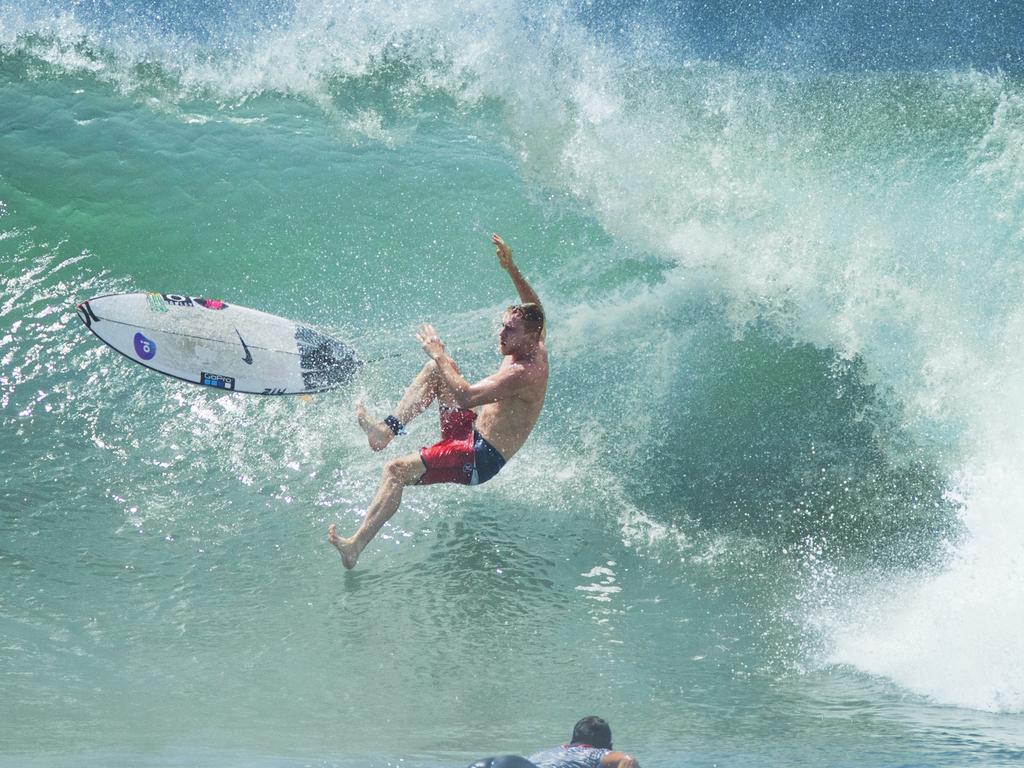 A surfer falls from his board in big surf conditions at Noosa National Park as swell from Cyclone Oma continues to pound the Sunshine Coast. Picture: Lachie Millard