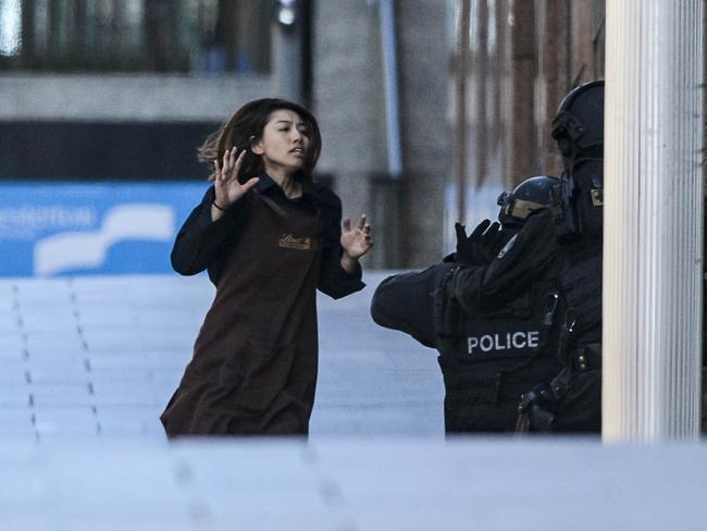 Lindt worker Elly Chan makes a bolt for freedom. Picture: Chris McKeen.