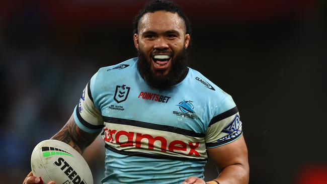 MELBOURNE, AUSTRALIA - MAY 11: Siosifa Talakai of the Sharks runs in to score a try during the round 10 NRL match between Melbourne Storm and Cronulla Sharks at AAMI Park on May 11, 2024 in Melbourne, Australia. (Photo by Graham Denholm/Getty Images)