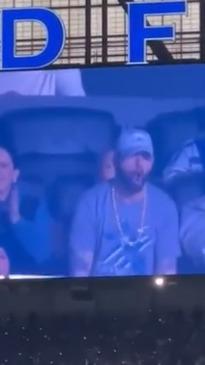 Crowd goes wild as rarely seen Eminem pumps up crowd at NFL Lions game