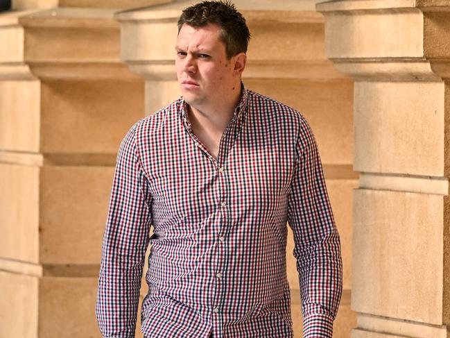 ADELAIDE, AUSTRALIA - NewsWire Photos October 18, 2023: Former Yorke Peninsula school teacher Thomas Ackland enters the Adelaide Magistrates Court where he is facing charges for multiple child-sex offences. Picture: NCA NewsWire / Brenton Edwards