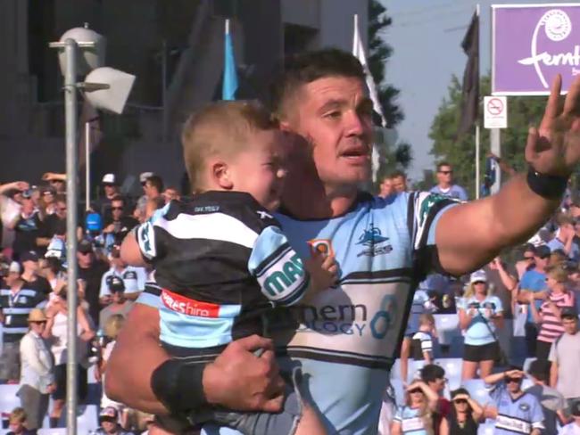 10/04/2016: Cronulla veteran Chris Heighington’s son Rocco pulled from under a buggy following Sharks win. Source: FOX SPORTS