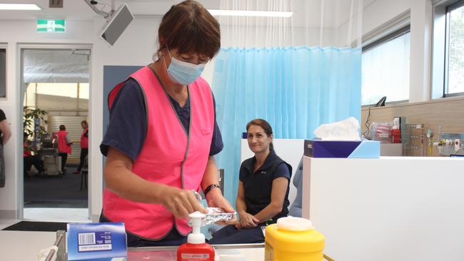 Jannelle Nichol gets one of the first Covid-19 vaccine administered at Coffs Harbour hospital's vaccination hub on Wednesday Martch 17.  Photo: Tim Jarrett / Coffs Coast Advocate