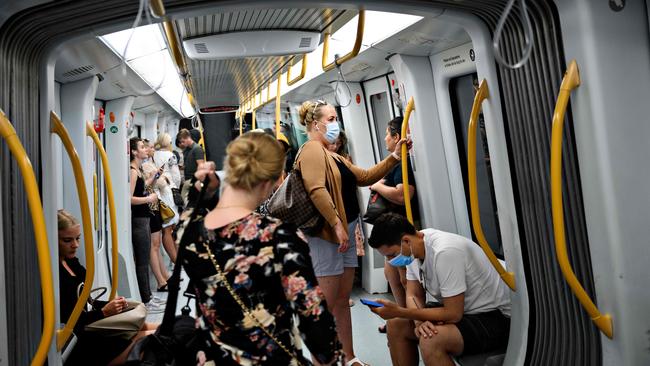 Commuters on a train in Copenhagen.