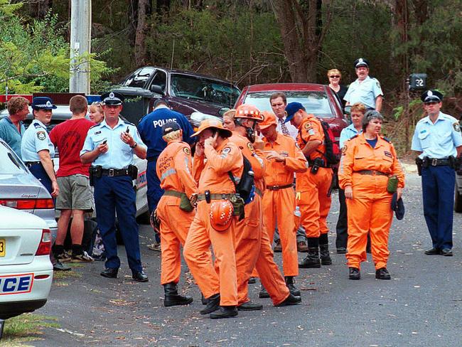 Police and SES officers assembling in Point Clare in 2001 to search for then-missing toddler Courtney Morley-Clarke.