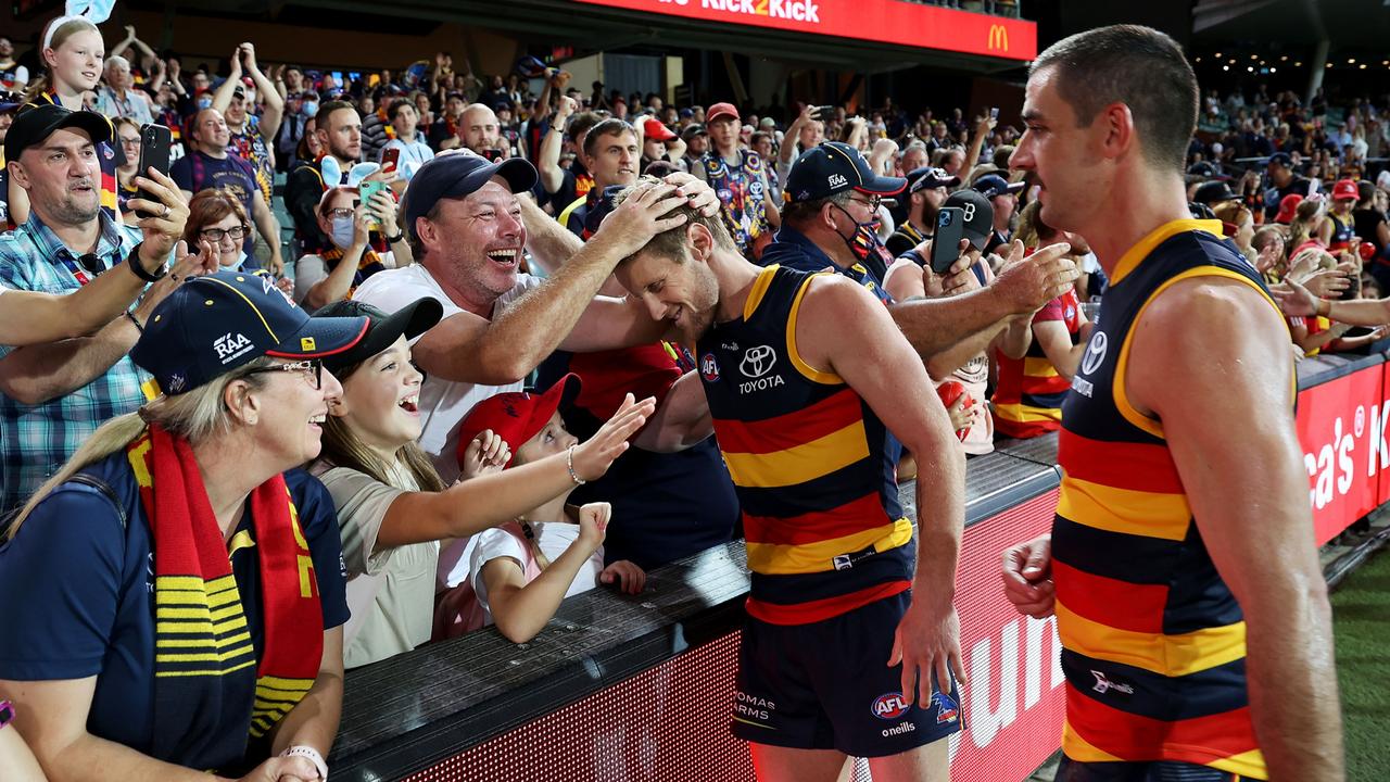 Sloane and Walker celebrate their confidence-boosting win. Picture: AFL Photos via Getty Images