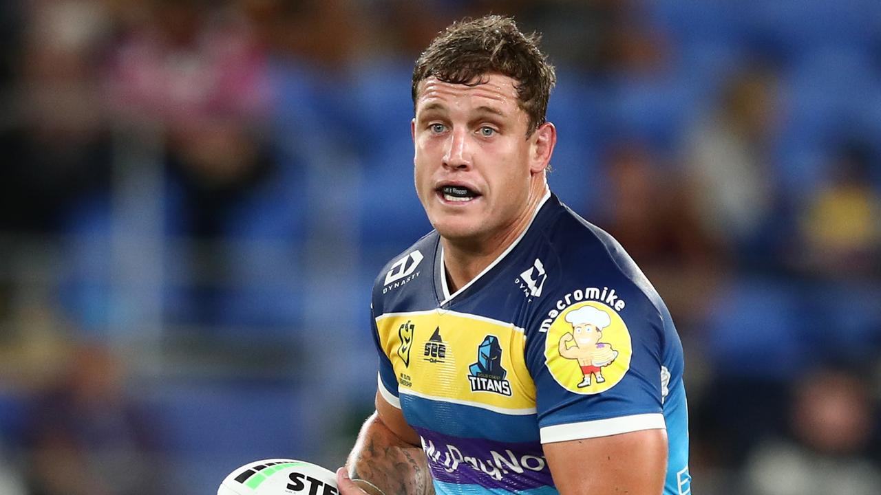 GOLD COAST, AUSTRALIA - MARCH 31: Jarrod Wallace of the Titans runs the ball during the round four NRL match between the Gold Coast Titans and the Wests Tigers at Cbus Super Stadium, on March 31, 2022, in Gold Coast, Australia. (Photo by Chris Hyde/Getty Images)