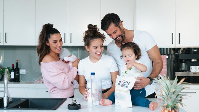 Sam Wood, pictured with his family at their Melbourne home, tells his top tips on staying fit in iso.