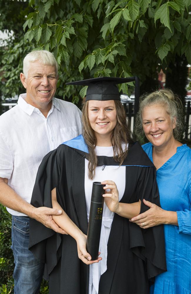 Graduate Nadia Corbett is congratulated by parents Tim and Elise Corbett at a UniSQ graduation ceremony at Empire Theatres, Tuesday, February 13, 2024. Picture: Kevin Farmer