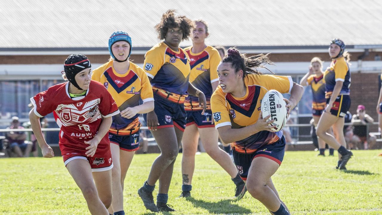 Tyra Mitchell on the charge for the Western Mustangs. Picture: Nev Madsen.