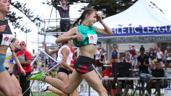 Jordan McMillan after crossing the line first in the 2018 women’s Bay Sheffield. Picture Dean Martin