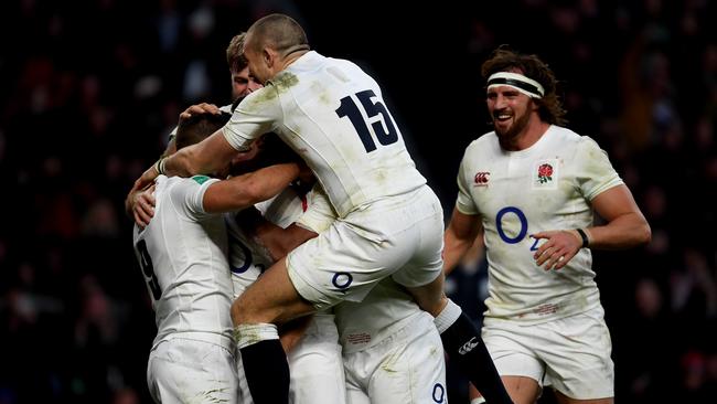 Ben Youngs of England celebrates scoring his side’s third try.