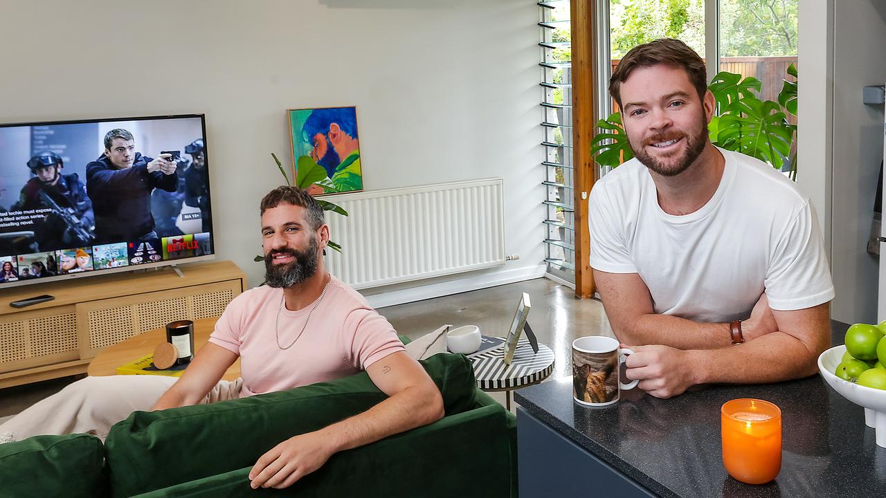 Phillip Pavlou and Liam Davis are happy with the convenience of their newly purchased apartment. Picture: Ian Currie