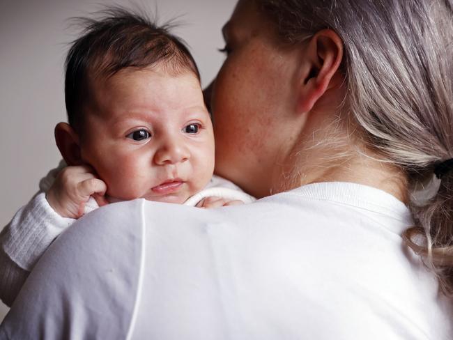 Mum Karley Paine with their newborn Gigi. Picture: Sam Ruttyn