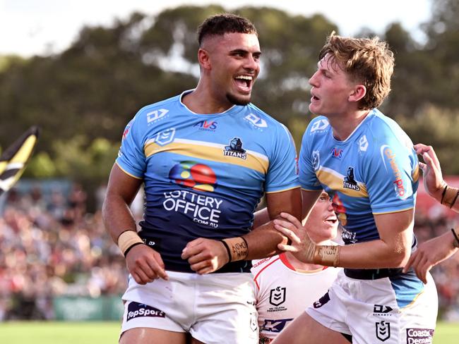 Tony Francis of the Titans celebrates after scoring a try during the NRL Pre-season challenge. Picture: Bradley Kanaris/Getty Images