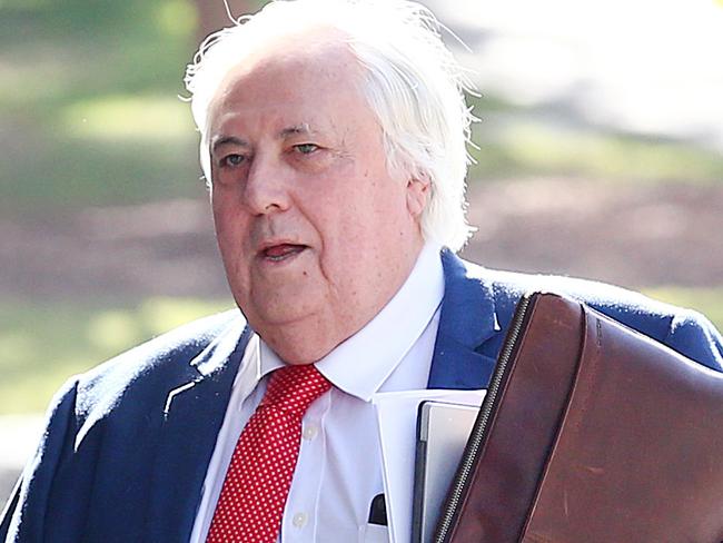 Businessman Clive Palmer arrives to the District Court in Brisbane, Thursday, July 25, 2019. Liquidators are trying to claw back $200 million in claims owed by Mr Palmer over the collapse of Queensland Nickel. (AAP Image/Jono Searle)