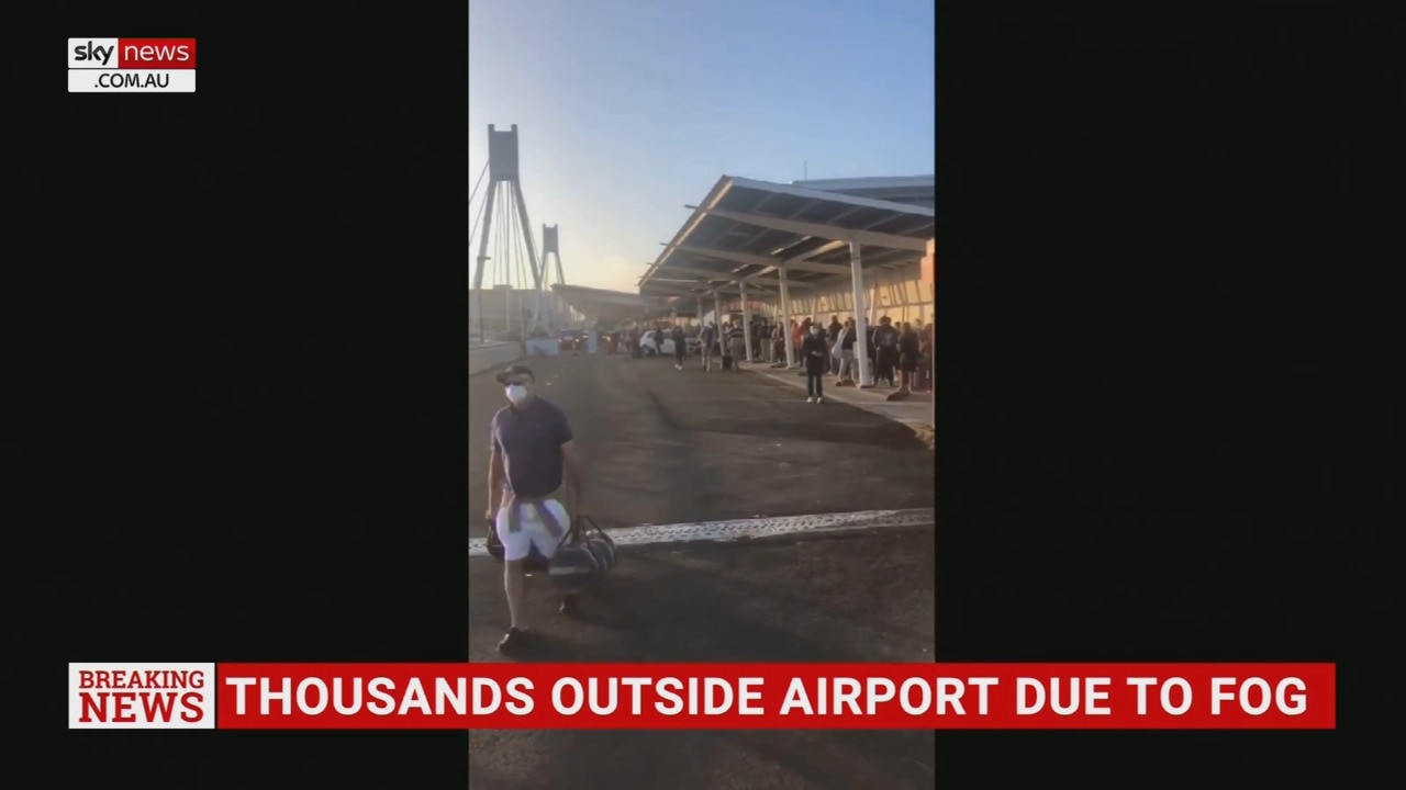 Thousands forced to wait outside Sydney Airport due to fog