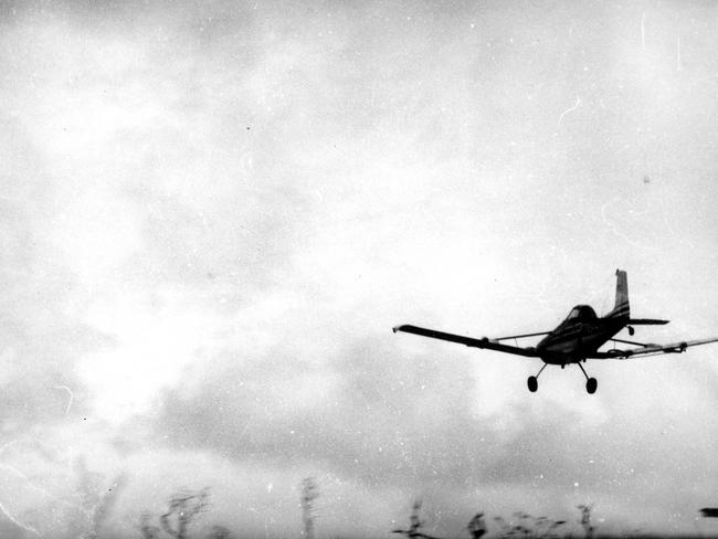 Cyclone Tracy caused major destruction to Darwin. A light plane spraying Darwin with pesticide after Cyclone Tracy. Picture: Kerry Byrnes.