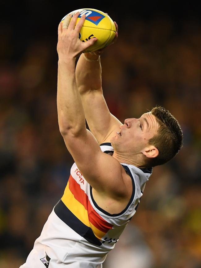 Josh Jenkins of the Crows takes a mark last night. Picture: AAP