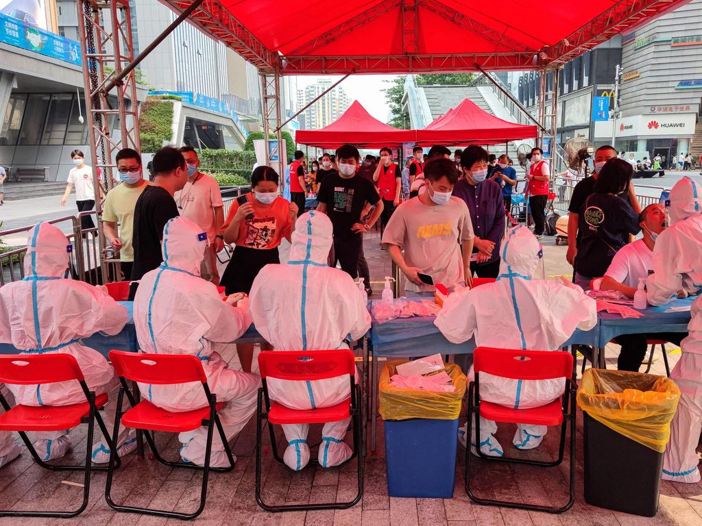 People receive nucleic acid tests for Covid in Shenzhen, in China's southern Guangdong province. Picture: AFP