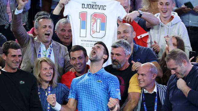 Djokovic celebrates with Ivanisevic (right) and friends and family after his 6-3, 7-6, 7-6 victory over third seed Stefanos Tsitsipas. Picture: Getty Images