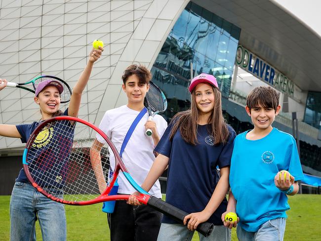 Cheaper youth tickets will be available for the 2025 Australian Tennis Open. Olive Newell 14yrs, Clio Fayers 14yrs , Ashwyn Hopgood 14yrs and Darcy Hopgood 11yrs outside Rod Laver Arena. Picture: Ian Currie