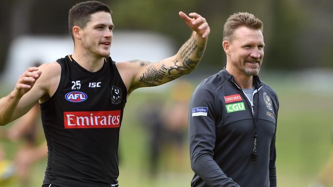 Jack Crisp, pictured with Nathan Buckley, is worth consideration as an underpriced defender. Picture: Julian Smith.