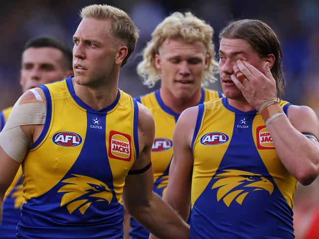 PERTH, AUSTRALIA - MARCH 16: Oscar Allen and Harley Reid of the Eagles walk from the field at the half time break during the round one AFL match between West Coast Eagles and Gold Coast Suns at Perth Stadium, on March 16, 2025, in Perth, Australia. (Photo by Paul Kane/Getty Images)