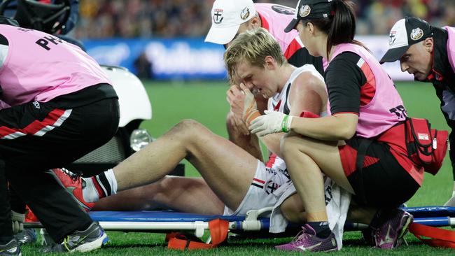 Hugh Goddard is taken off the field.