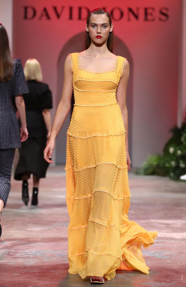 A model wearing Rachel Gilbert rehearses her catwalk routine. Picture: Mark Metcalfe/Getty Images for David Jones