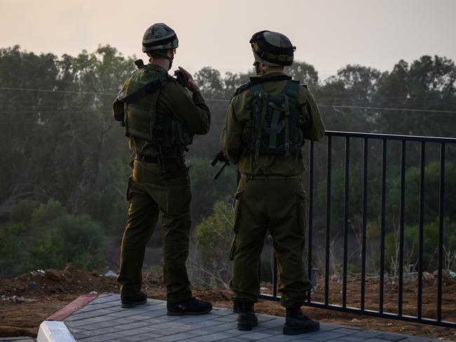 Members of the Israeli Defence Force look out towards Gaza. Picture: Getty Images