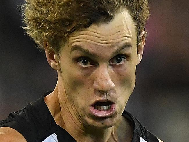 Chris Mayne of the Magpies is seen in action during the Round 1 AFL match between the Collingwood Magpies and Western Bulldogs at the MCG in Melbourne, Friday, March 24, 2017. (AAP Image/Julian Smith) NO ARCHIVING, EDITORIAL USE ONLY