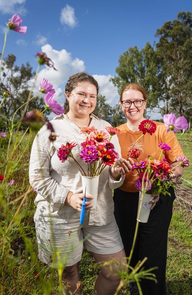 Cassie Rudd (left) and Rachel Hagger with their gorgeous flowers as Karinya in the Valley host a pick your own flower session, Saturday, January 4, 2025. Picture: Kevin Farmer