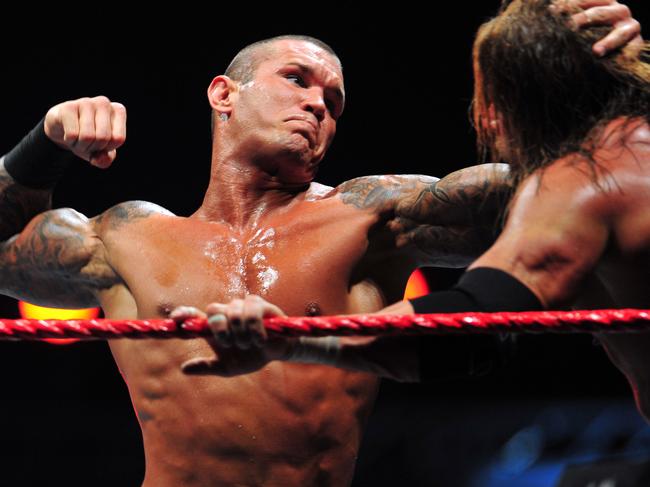 WWE wrestling at Vodafone Arena. Randy Orton slams into Triple H