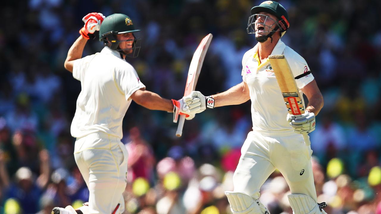 Australia’s Shaun Marsh celebrates his century with his brother Mitchell Marsh during the 5th Ashes Test between Australia and England at the SCG. Picture. Phil Hillyard