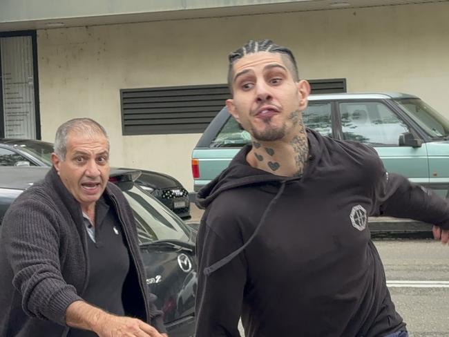 Issa Haddad (right) outside Fairfield Local Court on May 8.