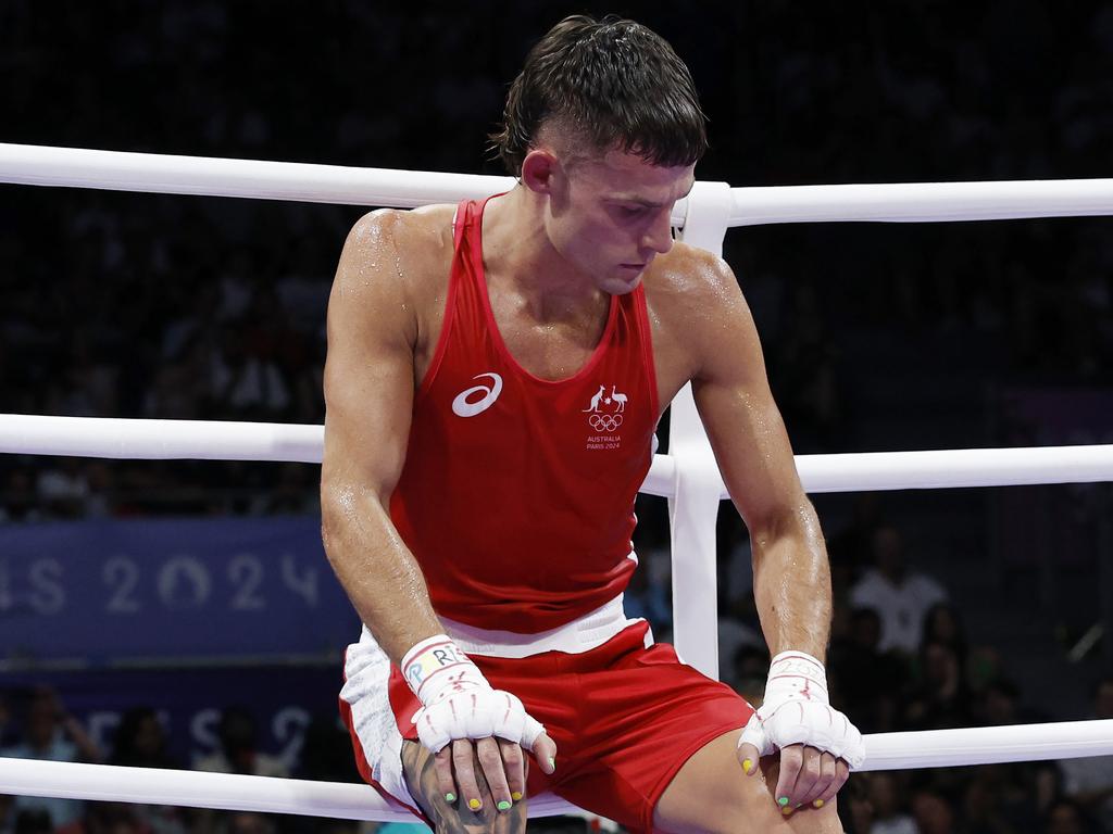 Harry Garside sits on the ropes after losing to Hungary’s Richard Kovacs. Picture: Michael Klein