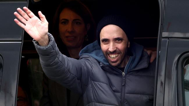 Tal Shoham waves to supporters after arriving at Beilinson Hospital in the Rabin Medical Centre in Petah Tikva in central Israel. Picture: AFP