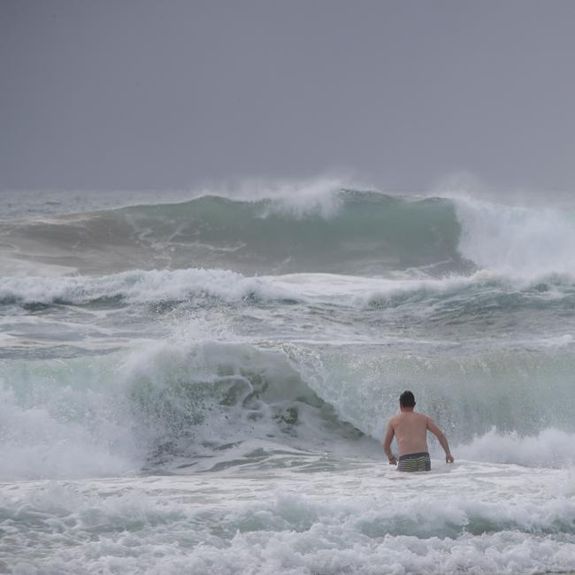 Day three of the Gold Coast lockdown. Going for a swim at Broadbeach.. Picture Glenn Hampson