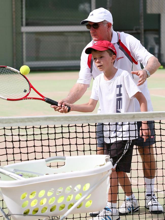 Tom Horn coaches Alex Liron at Edge Hill Tennis Club in 2008.