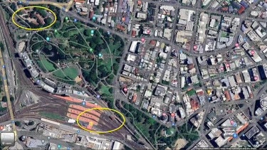 The existing planned site for Brisbane Arena above Roma Street railway station (bottom circle), and the alternative site being evaluated on the opposite site of the Roma St Parklands.