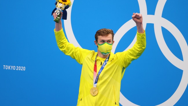 Izaac Stubblety-Cook celebrates on the podium after winning gold in the Men's 200 meter breaststroke. Photo: Abbie Parr/Getty Images